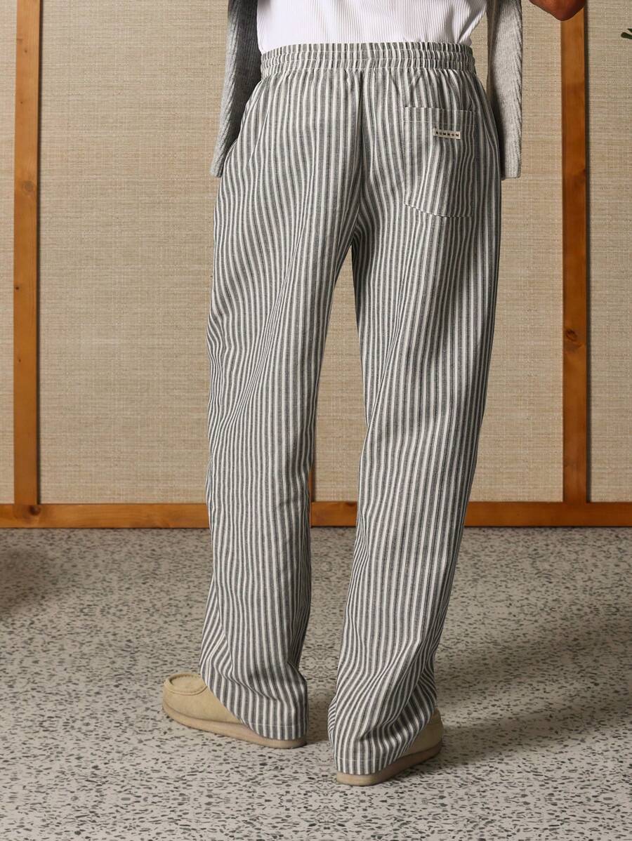 Calça Pavtros Studios Linen Pinstripe Relaxed Trousers