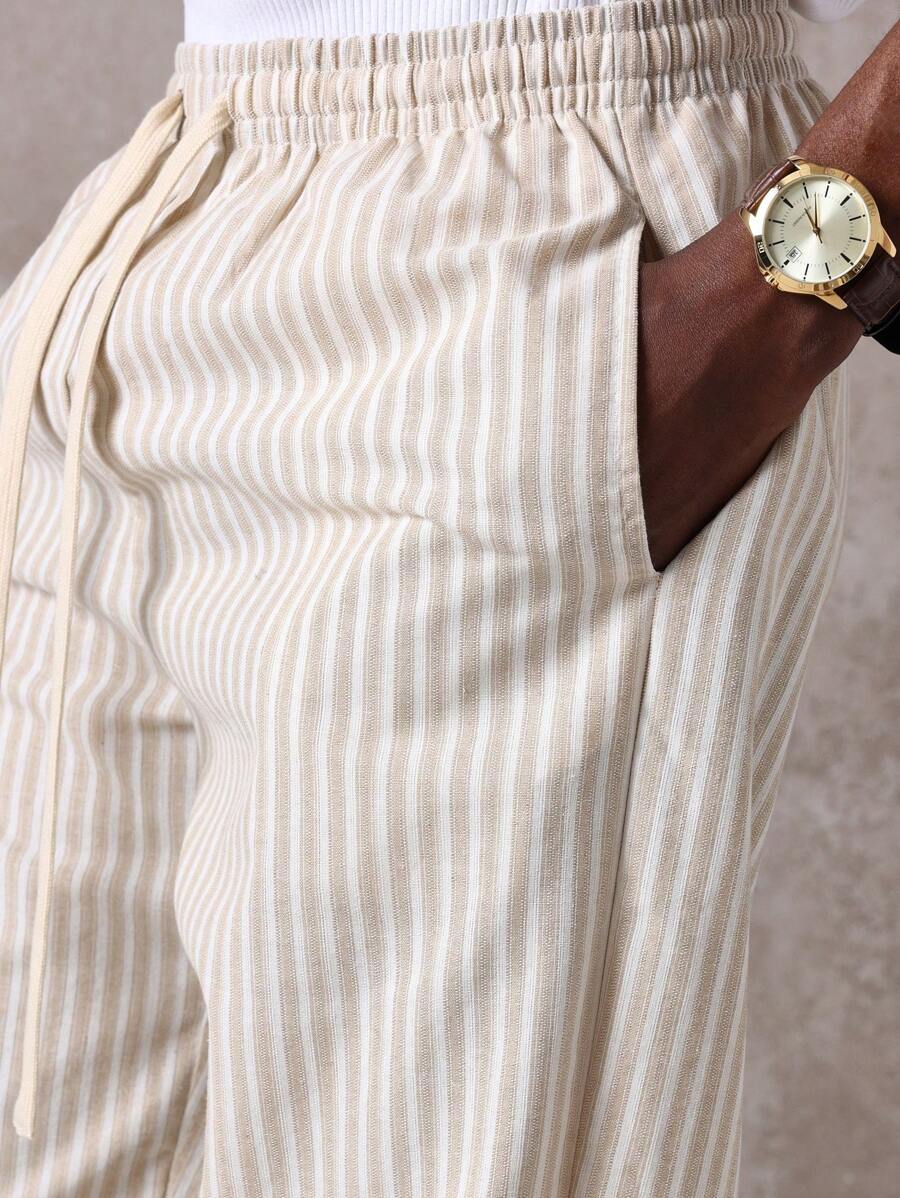 Calça Pavtros Studios Linen Pinstripe Relaxed Trousers