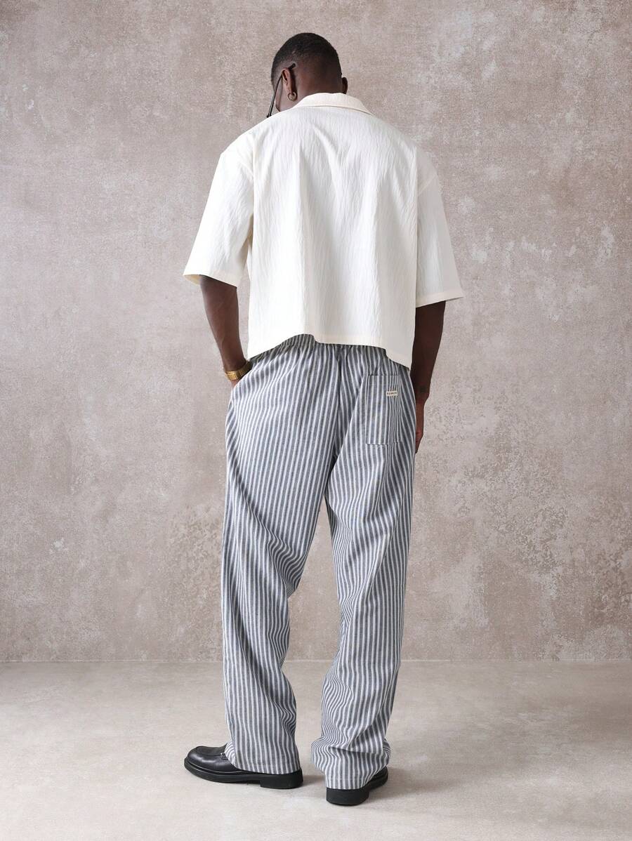 Calça Pavtros Studios Linen Pinstripe Relaxed Trousers