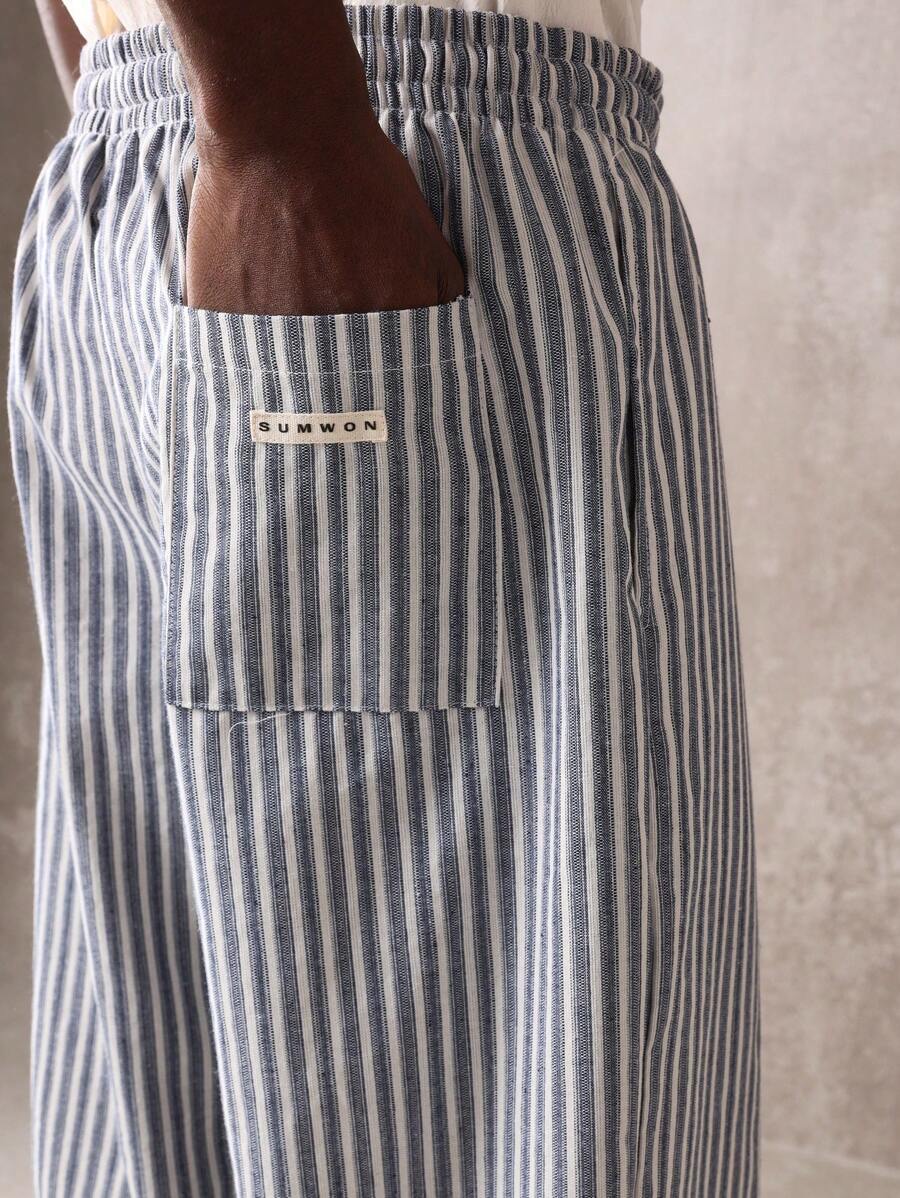 Calça Pavtros Studios Linen Pinstripe Relaxed Trousers