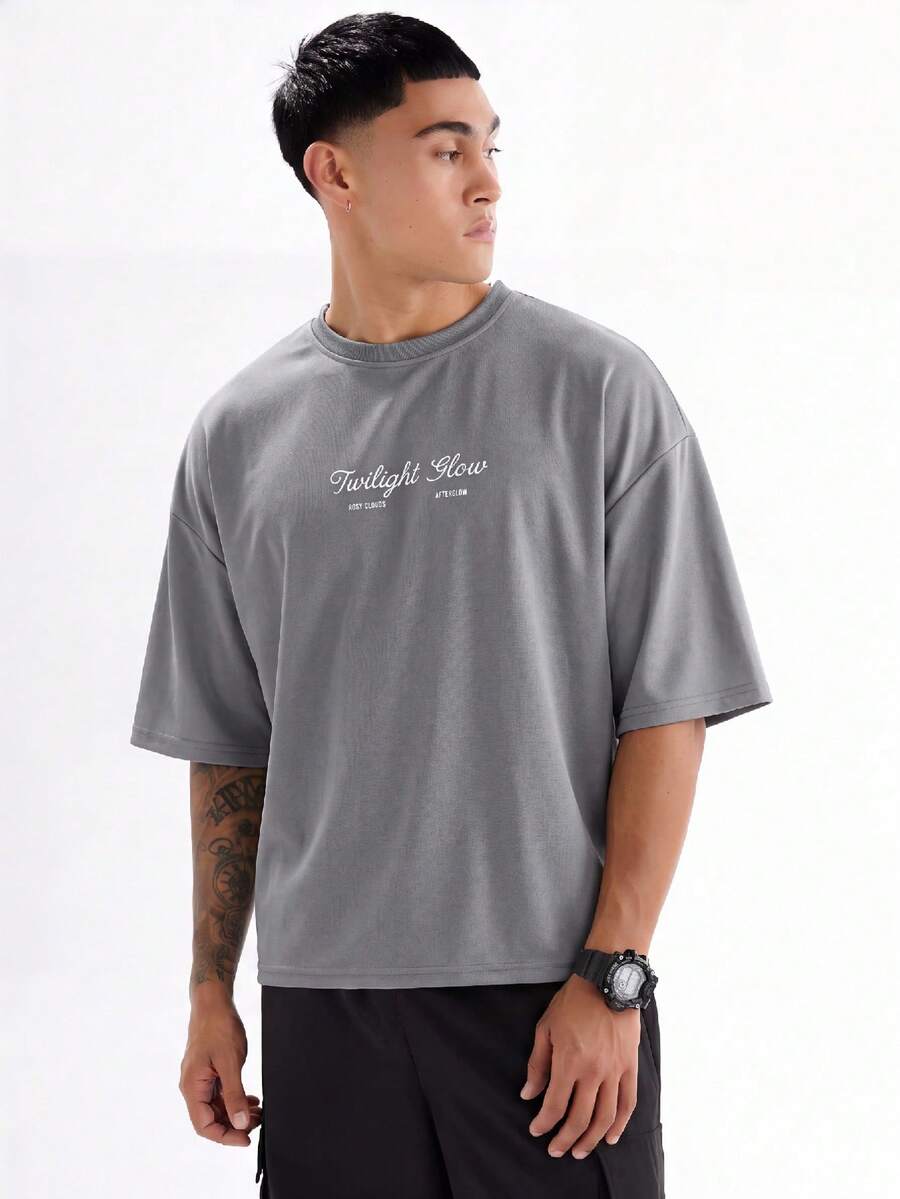 SWAVVY Camiseta Casual Masculina com Estampa de Letra, Decote Redondo e Ombros Caídos, Verão