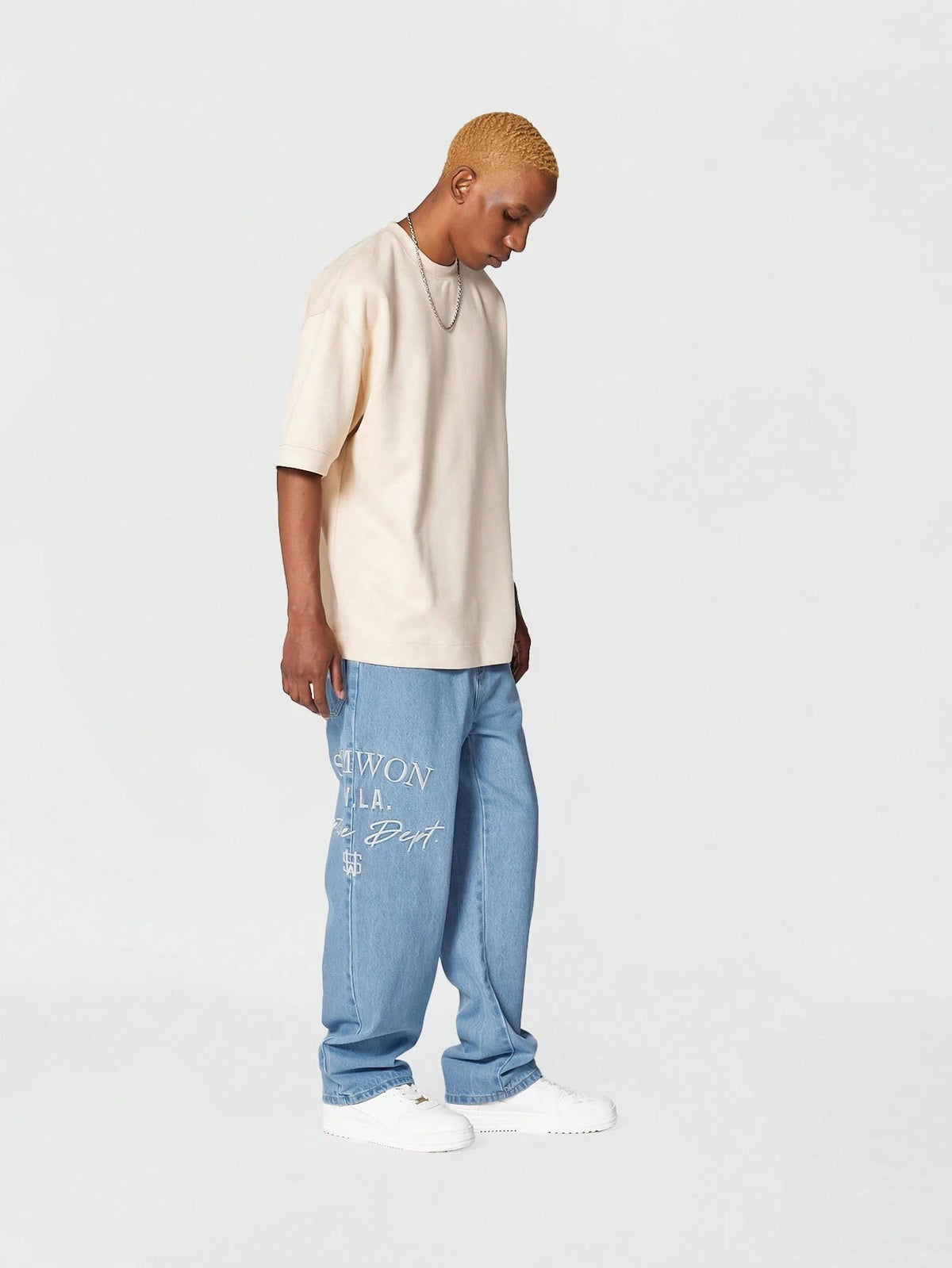Calça Pavtros Denim reta com bordado
